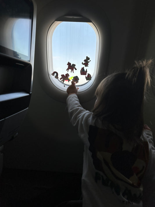 Flying with Toddlers: Genius Tips to Survive (and Maybe Even Enjoy) a Long Plane Ride!