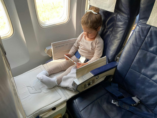 Tips for Traveling on a Plane with Kids: Making the Skies Friendlier for Families